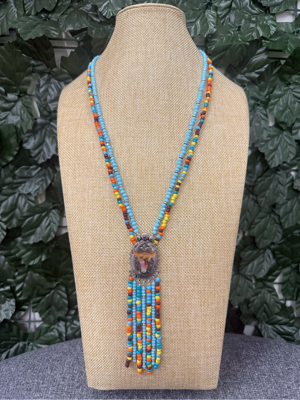 Justin beaded long tassel necklace with silver skull pendant